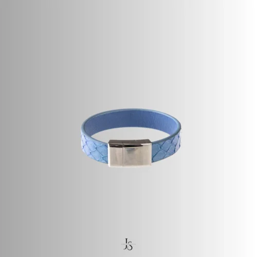 Matching collar and bracelet set in sapphire blue leather with clasp detail on Sapphire Vow