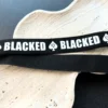 blacked strap on a plate