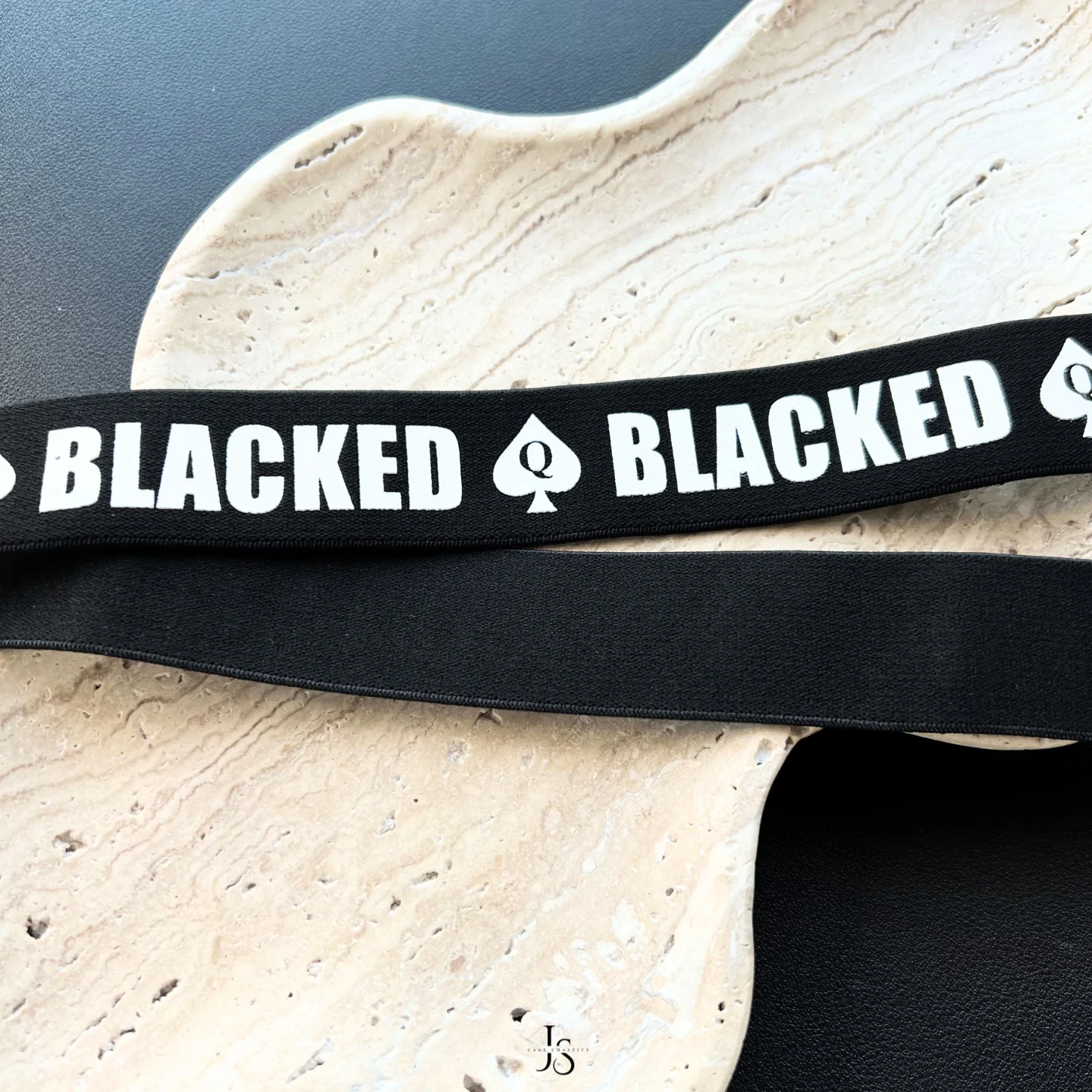 blacked strap on a plate