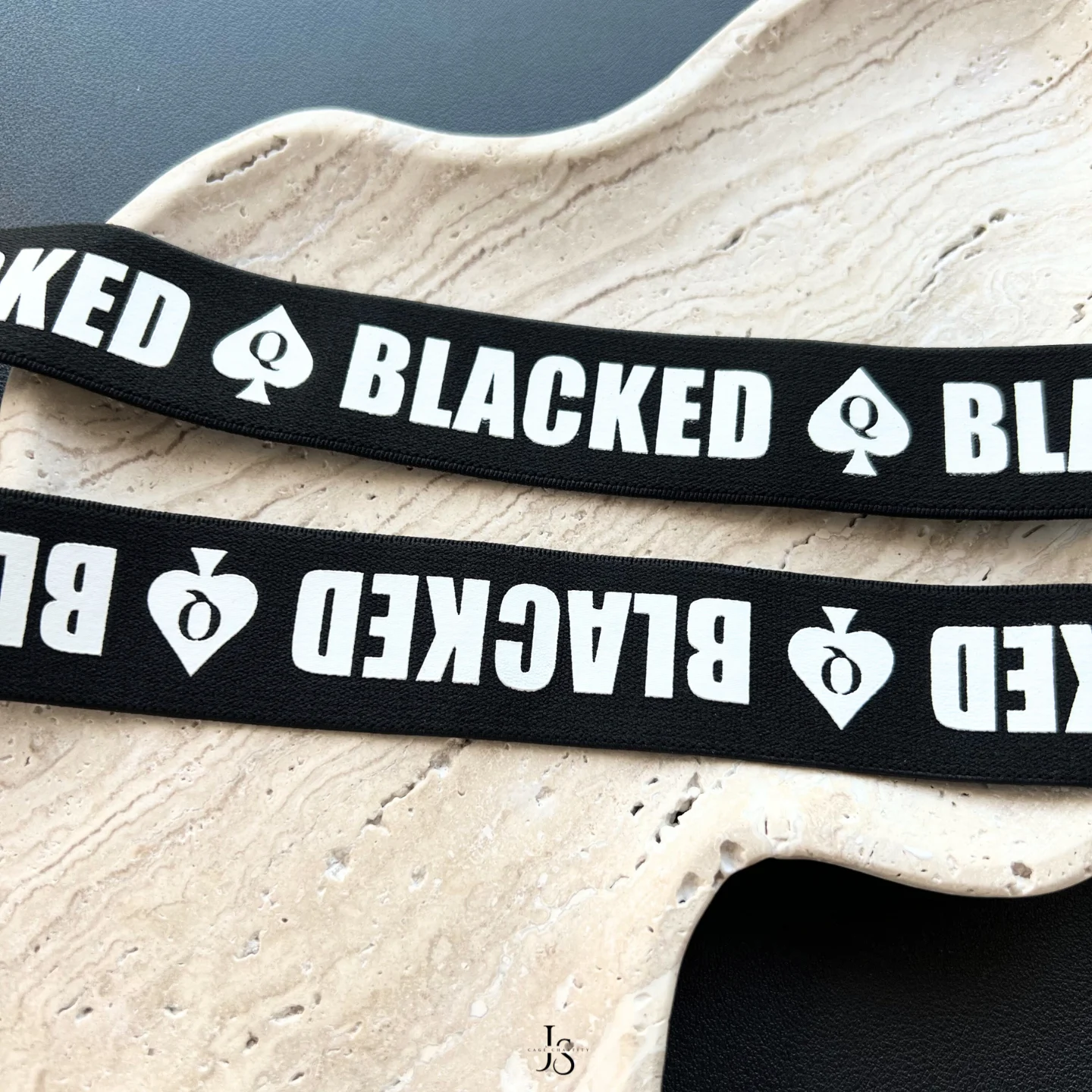 strap details with letters