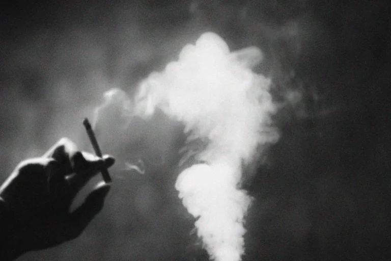 one hand hold cigarette, smoking