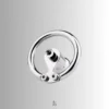 Polished steel front angle showing U-cap attachment