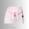 pink lace strap with two white bells and a pink cage