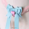 blue bow tie with pink lace strap
