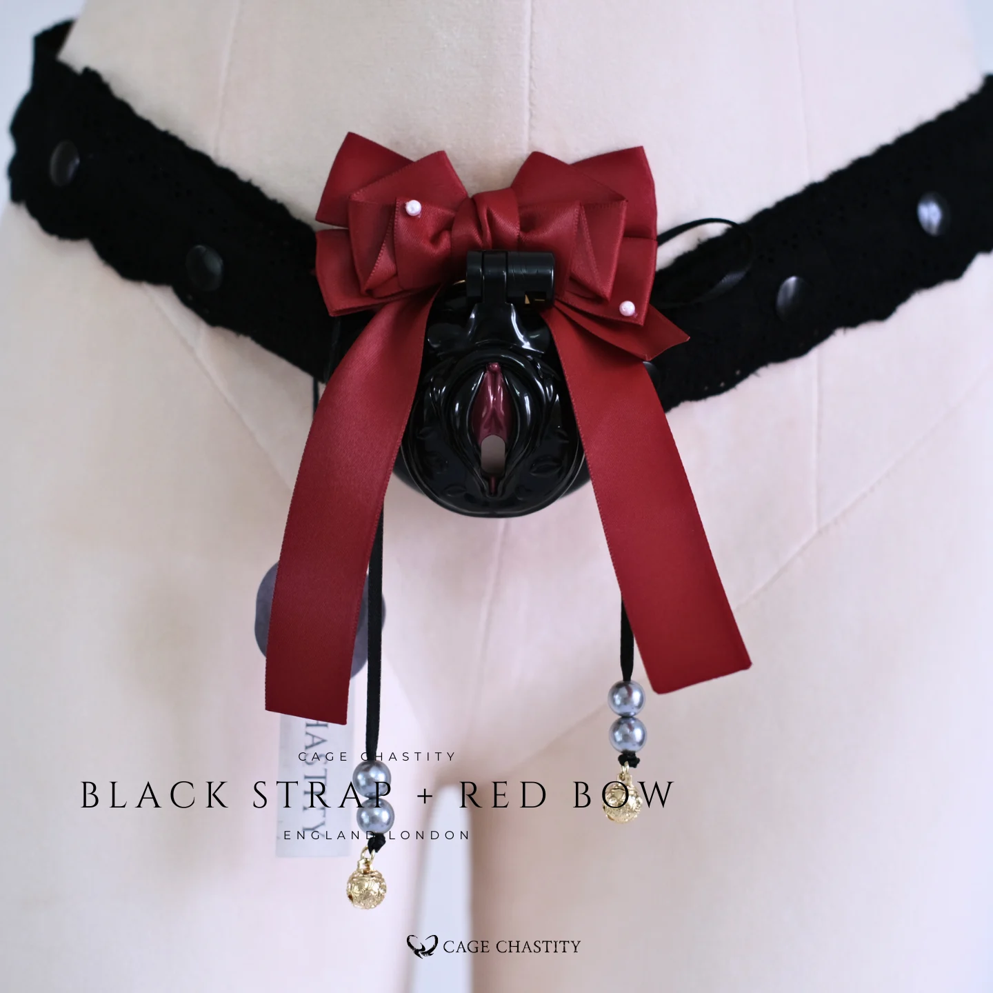 the cage with red bow tie