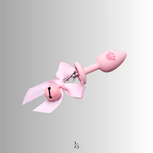 the pink plug with bell and a paw mark