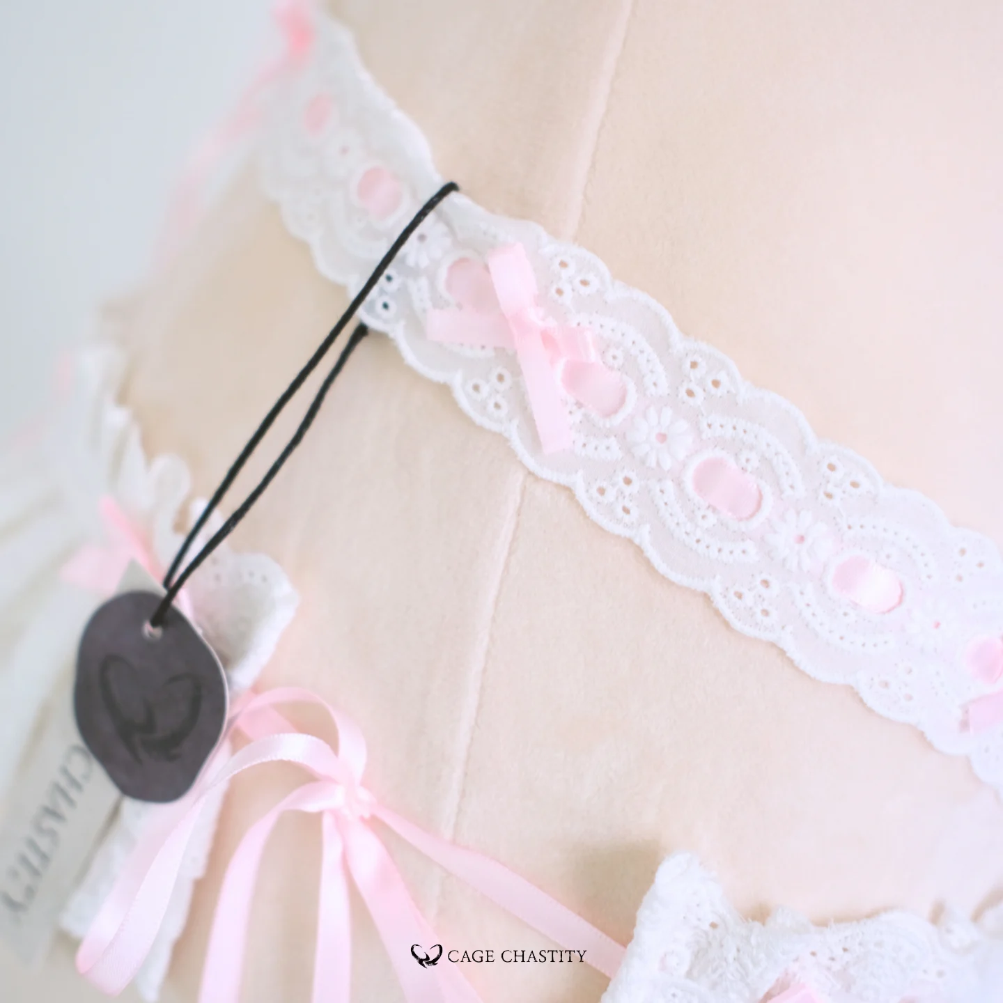 ribbon decorations on the white lace strap with cc tag