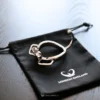 the ring with a hook laying on the bag
