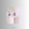ribbon dream lace lock strap with butterfly metal cage on, pink bow tie and white lace strap