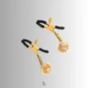 the golden bell nipple clamp with black plastic and gold metal