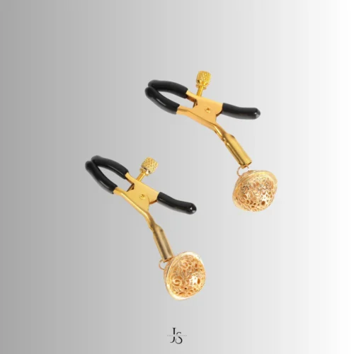 the golden bell nipple clamp with black plastic and gold metal