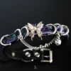 the silver butterfly design on the front of the collar