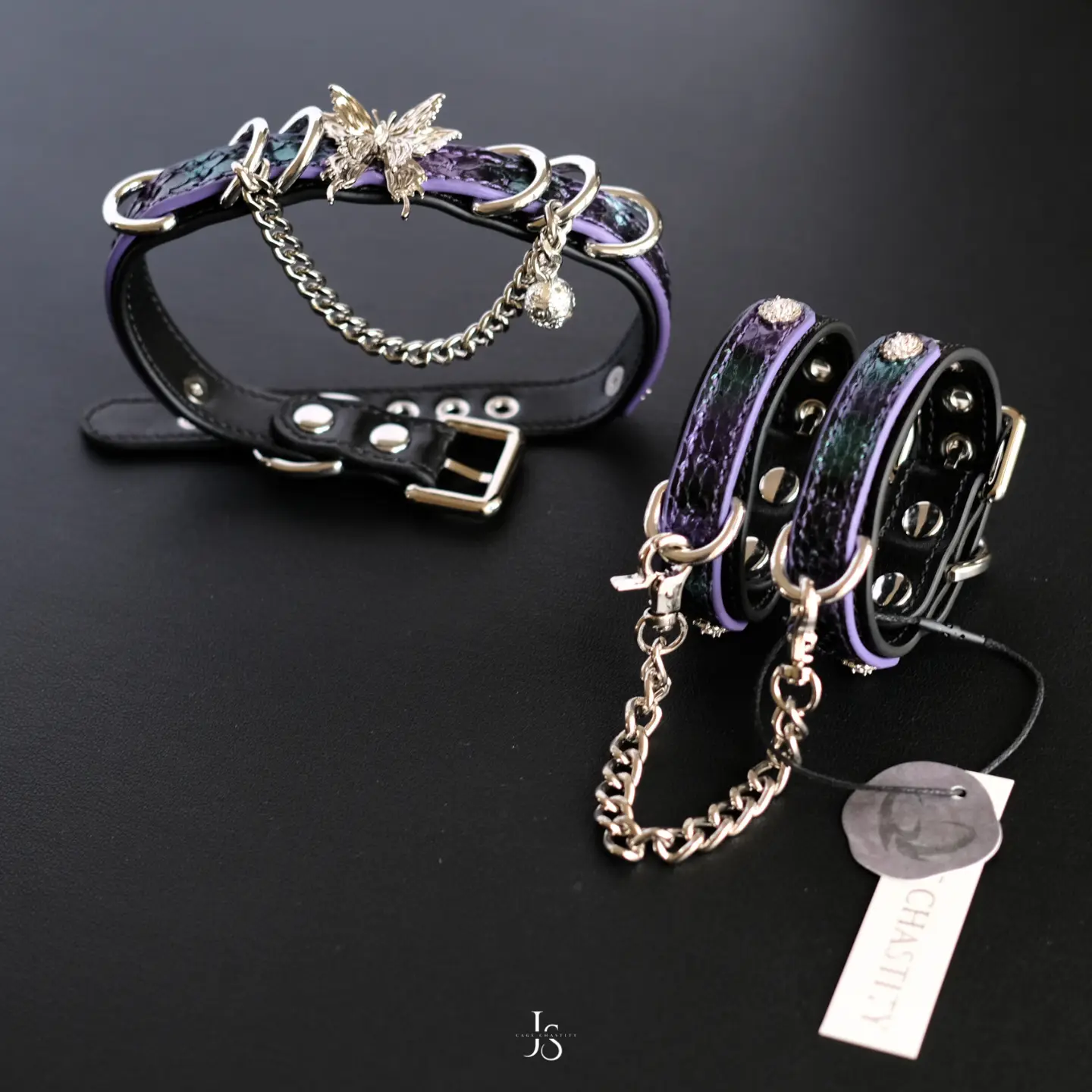 the two cuffs with metal chains