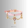 pink collar with purple gem