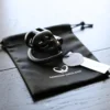 the black cobra cag sitting on cc bag with cc tage