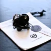 the nub htv3 in black color on white cc bag