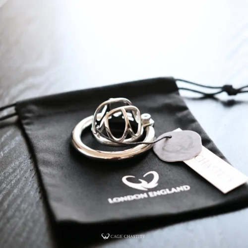 the cage with tag on the black cc storage bag