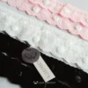 pink white and black strap with white lace