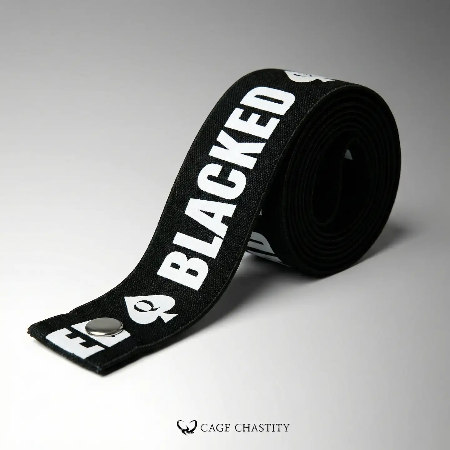 the metal snap of the belt