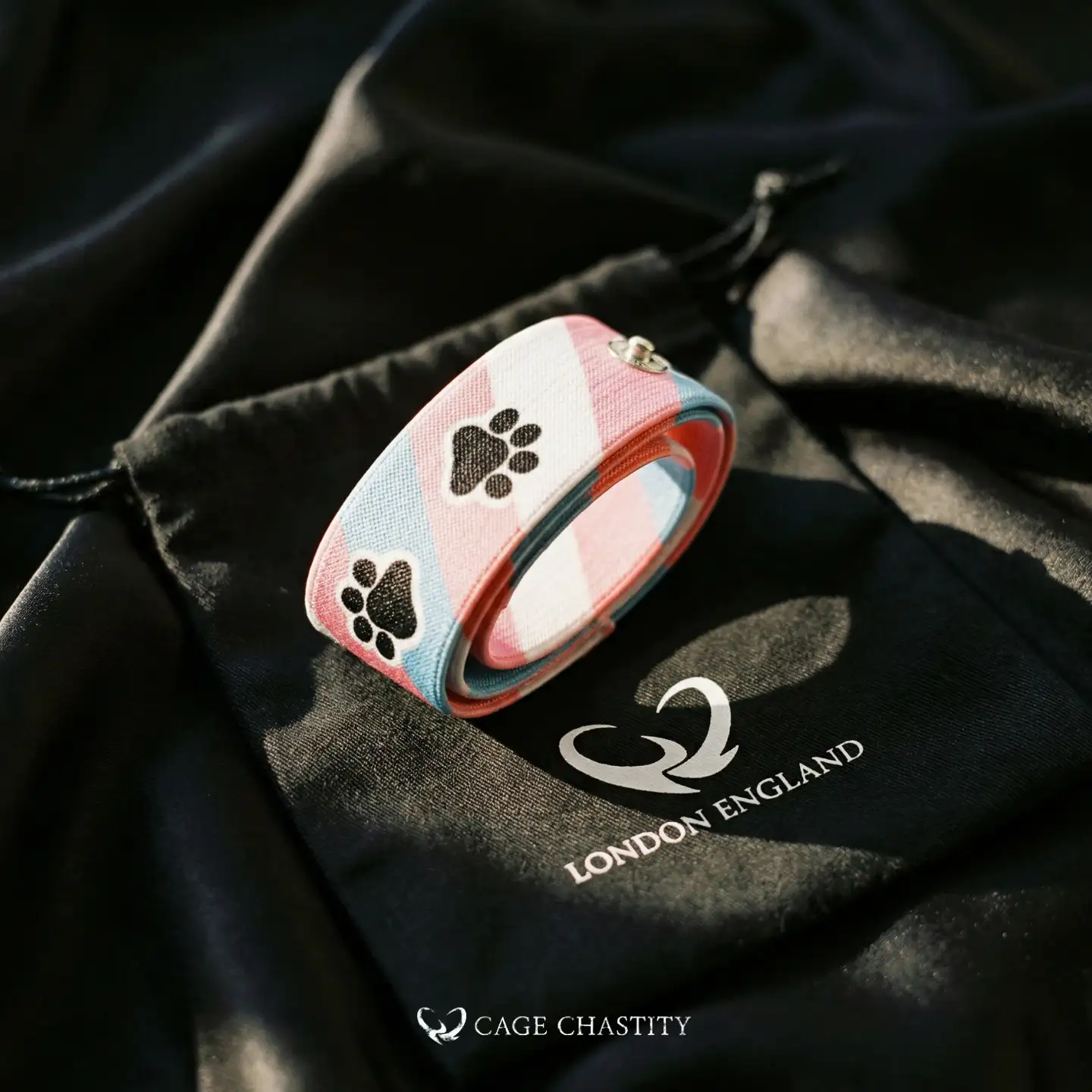 the bag with pink and white color, with paw marks on it