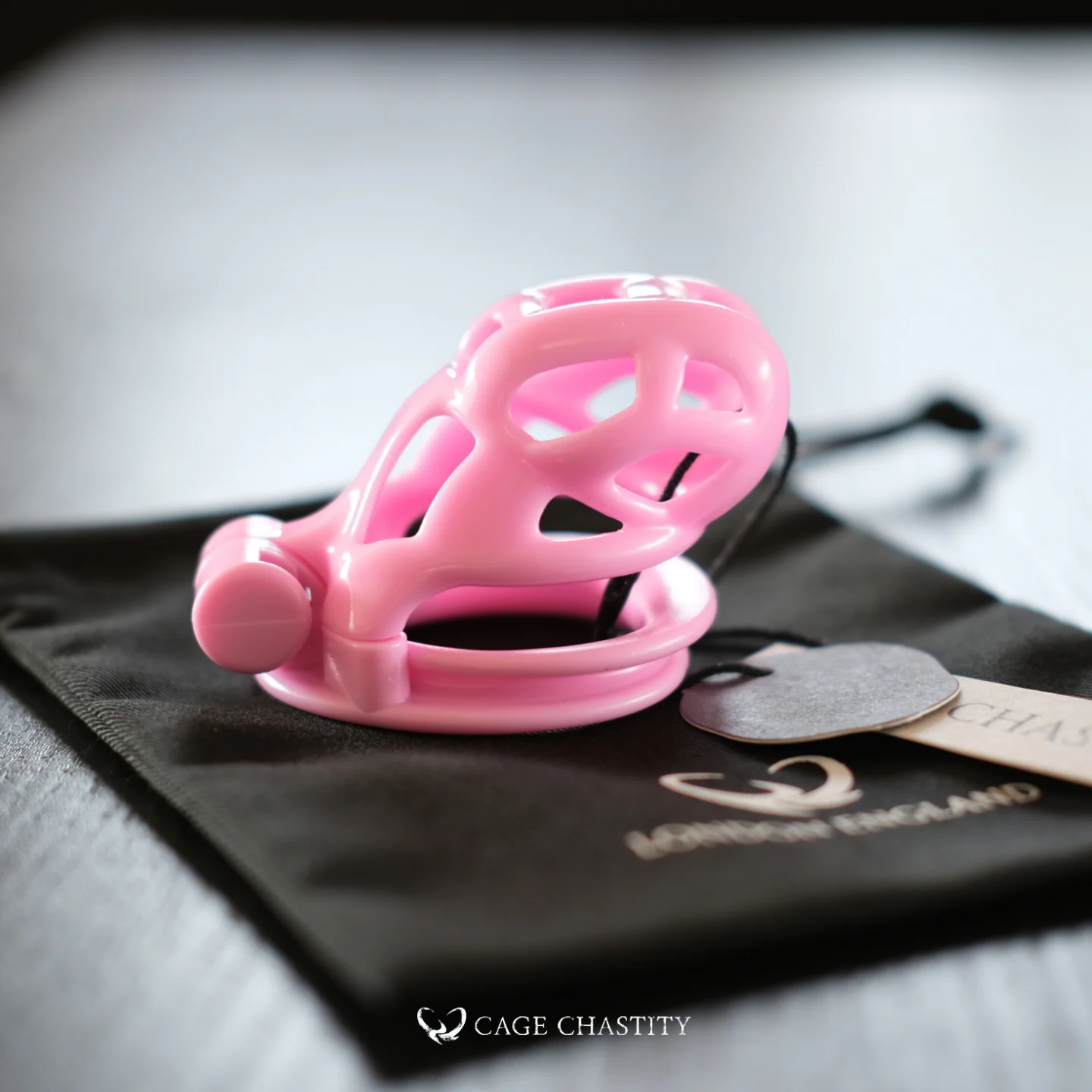 the side view of the m size pink cobra on the cc storage bag with cc tag