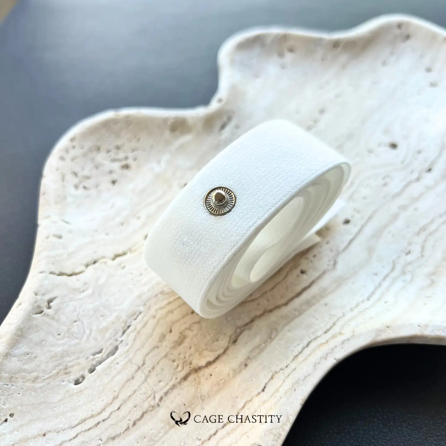 the white strap rolled up