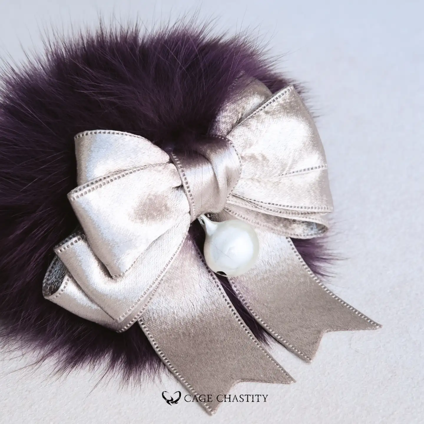 the purple plug with bell