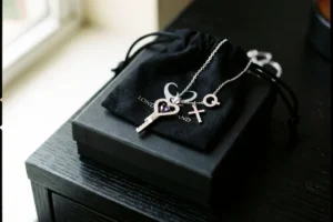 chastity key with a decorative gemstone for a keyholder