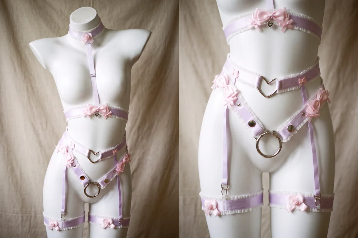 white mannequin wearing a sexy bondage lingerie set
